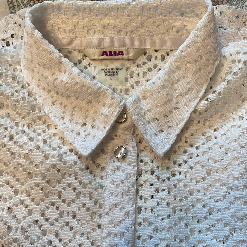 White button-up shirt in lacy fabric